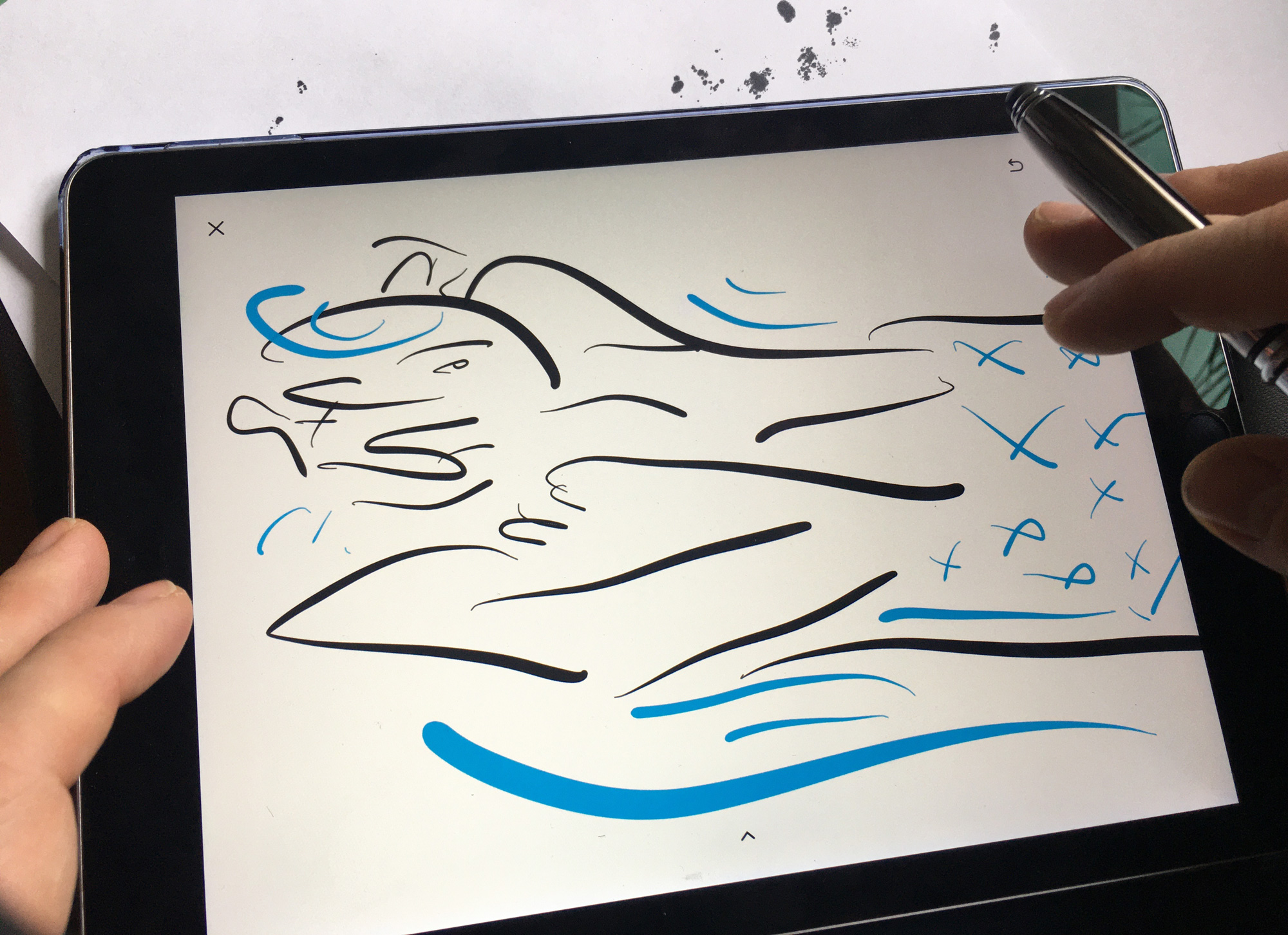 Tablet showing digital sketch.